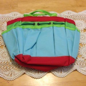 Cute, small bag for makeup, art supplies, small gardening tools, etc.